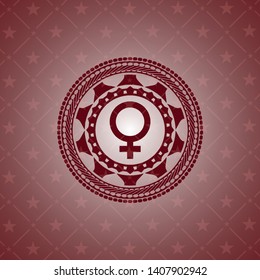 female icon inside red icon or emblem