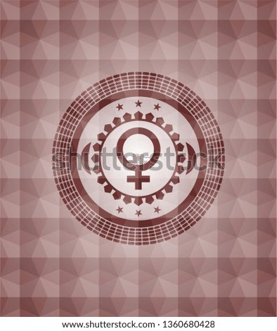 female icon inside red seamless emblem with geometric background.