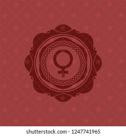 female icon inside retro style red emblem