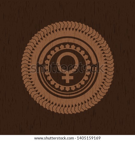 female icon inside retro style wooden emblem