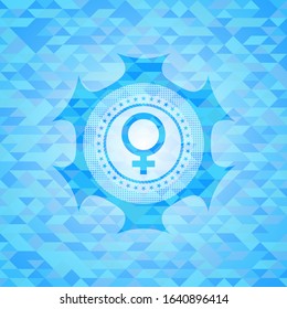 female icon inside sky blue mosaic emblem