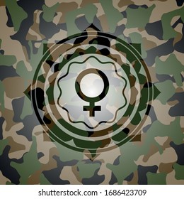 female icon on camo pattern