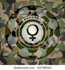 female icon on camouflaged pattern