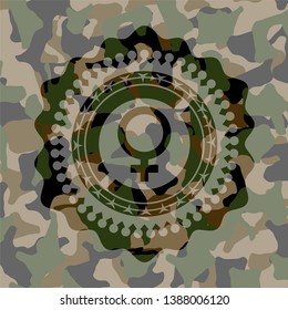 female icon on camouflaged pattern