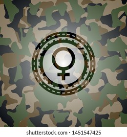 female icon on camouflaged texture