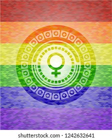 female icon on mosaic background with the colors of the LGBT flag