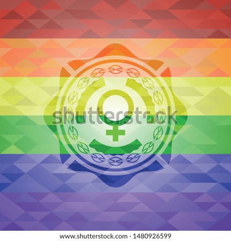  female icon on mosaic background with the colors of the LGBT flag