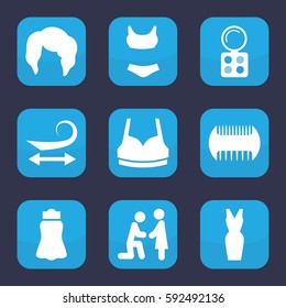 female icon. Set of 9 filled female icons such as comb, curly hair, woman hairstyle, eyeshadow palette, sport bra, skirt, dress, marriage proposal