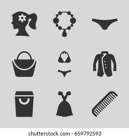 Female icons set. set of 9 female filled icons such as comb, woman face with flower in hair, necklace, woman bag, female underwear, dress, jacket, swimsuit