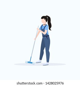 female janitor in uniform mopping floor woman cleaner holding mop cleaning service concept full length flat white background
