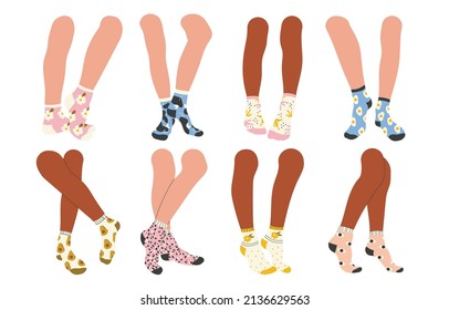 Female or male legs in stylish  socks set. Underwear with trendy, colorful prints. Footwear, cotton socks collection. Fashion accessories for everyday wearing. Isolated vector illustration