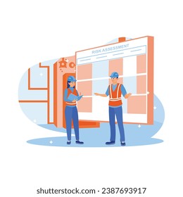 Female manager holding form, pen and risk matrix, standing with coworkers in factory workshop. Industrial risk assessment and safety audit. Finance control scenes concept. 