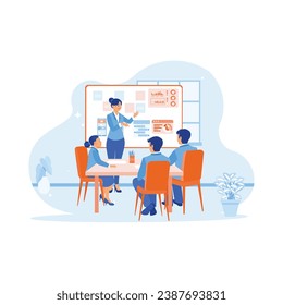 The female manager leads a business creative team meeting in a mobile app software design project. Discuss with each other during meetings in the office. Teamwork meeting concept. 