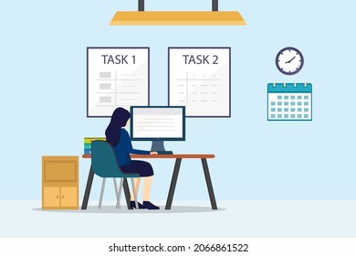 Female manager working overtime to finish task today while sitting in the office at night time