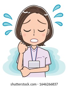 A female nurse wearing a whitish uniform.She has negative emotions.