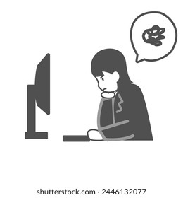 A female office worker leaning on her elbows looking displeased in front of her PC