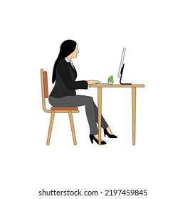 female office worker sitting in front of computer