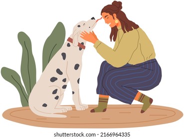 Female pet owner plays with dog. Caring four-footed friend. Happy lady with puppy, domestic animal licks face with tongue, human companion. Dog follows command, gives paw to woman. Girl training doggy