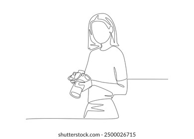 Female photographer is looking at the photos. World photography day concept one-line drawing