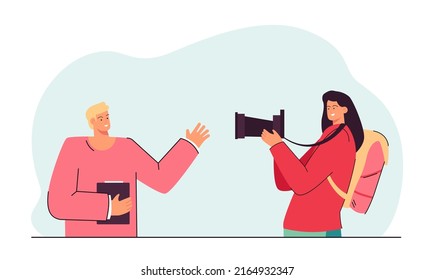 Female photographer taking photo of client or friend. Woman with professional camera filming man flat vector illustration. Photography, journalism concept for banner, website design or landing page