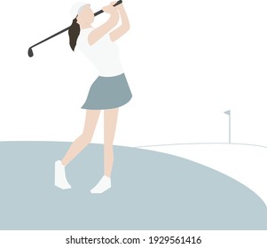 Female Pro Golfer Looking At The Ball After Her Swing