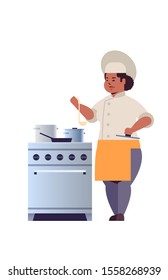 female professional chef cook preparing and tasting dishes african american woman restaurant worker in uniform near kitchen stove cooking food concept flat full length vertical vector illustration