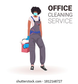 female professional office cleaner woman janitor in medical mask with cleaning equipment full length copy space vector illustration