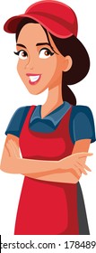 Female Sales Clerk Supermarket Employee Standing With Arms Crossed. Grocery store worker greeting clients with friendly smile
