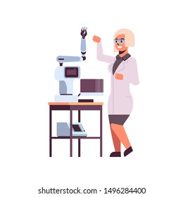 female scientist near industrial robotic arm woman in uniform with robot manipulator smart medical machine automatic technology concept full length flat