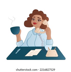 Female secretary with cup of coffee talking by telephone at work