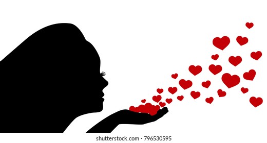 Female silhouette blows hearts from palm