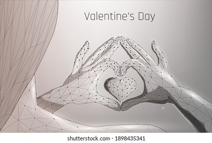 female silhouette and hands folded in the shape of a heart. Valentine's Day. A symbol of love and care. Glowing abstract 3d heart. Valentine's Day. Hands showing heart symbol. wireframe, plexus, dot