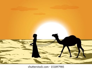female silhouette leads a camel through the desert at sunset