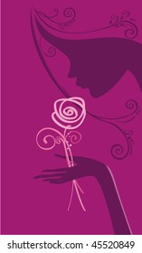 Female silhouette with rose