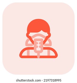 Female singer with microphone having mask on.
