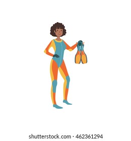Female Snorkeler In Long Suit Holding Fins