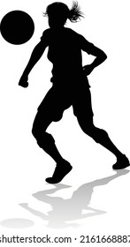 A Female Soccer Football Player Woman In Silhouettes