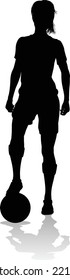 A Female Soccer Football Player Woman In Silhouettes