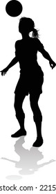 A Female Soccer Football Player Woman In Silhouettes