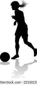 A Female Soccer Football Player Woman In Silhouettes