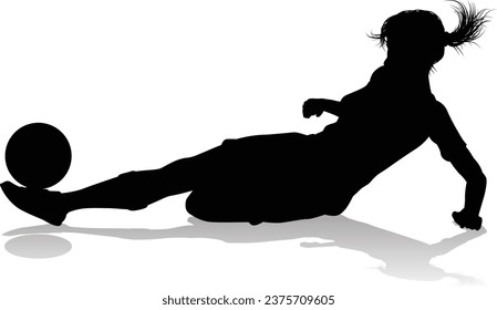 A female soccer football player woman in silhouettes