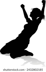 A female soccer football player woman in silhouettes