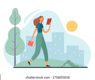 Female student in casual clothes walking along path in park and reading textbook against modern city while preparing for exam on summer day