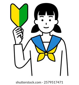 Female student holding up a beginner's mark