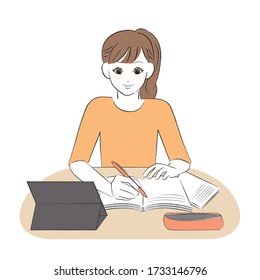 
Female student studying while looking at the tablet