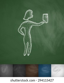 female taking selfie icon. Hand drawn vector illustration. Chalkboard Design