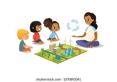 Female Teacher Discusses Ecology Green-city Using Model Landscape, Children Sit On Floor In Circle And Listen To Her. Preschool Activities And Early Childhood Education. Vector Illustration.