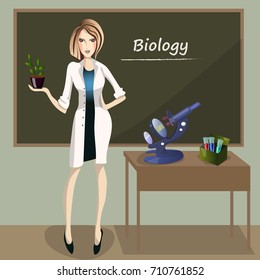 Female teacher in front of blackboard teaching student in classroom at school, college or university. Biology classroom with microscope and glass vial