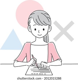Female teacher scoring the test