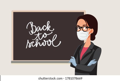 Female Teacher Wearing Mask and Gloves for School Reopening. School Reopening with safety measures due to corona virus
